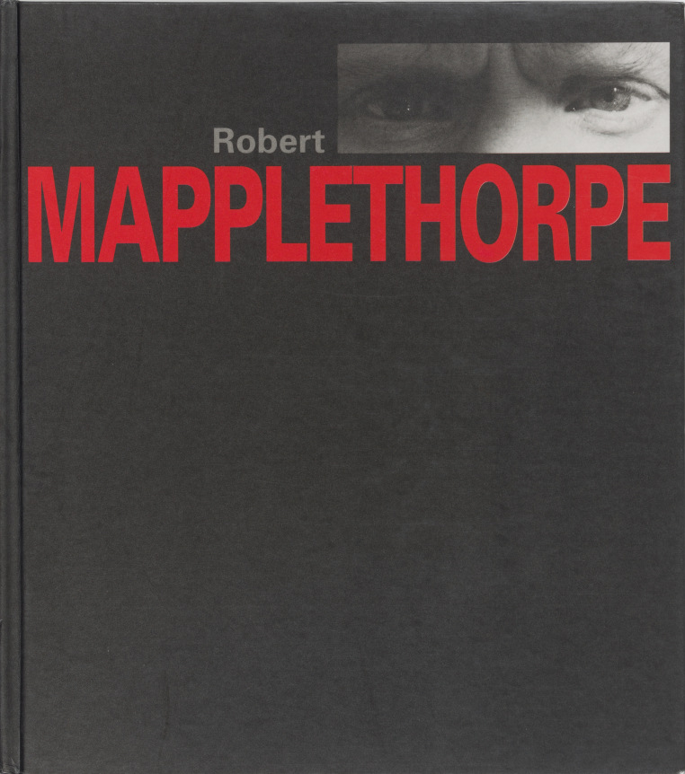 Black book cover with Gray and Red text and Self-portrait Eyes in the upper right corner.