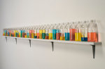 Tony Feher (Chanting One), 2008 Signed on shelf verso 34 glass bottles with screw caps, water, food color and painted wood shelf 8 1/4 x 120 1/2 x 3 1/2 inches 21 x 306.1 x 8.9 cm