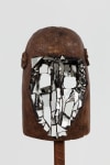 Kader Attia
Mirror Mask (detail)
2020
Wooden mask, mirror fragments, black pigment
Artwork Dimensions:
11 3/4 x 6 5/8 x 5 1/2 inches (30 x 17 x 14 cm)
Overall Dimensions:
70 x 10 x 10 inches (177.8 x 25.4 x 25.4 cm)