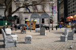 Liz Glynn Open House, 2016 cast concrete, 26 objects: 5 arches, 8 armchairs, 4 ottomans, 6 side chairs, and 3 settees dimension variable. Doris F. Freedman Plaza, Central Park, New York, NY. Photo: James Ewing, Courtesy of Public Art Fund, NY.