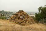 III, 2010, reclaimed wooden pallets, 16 x 27 x 27 feet
