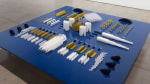 Tauba Auerbach Altar/Engine, 2015 3D printed nylon and plastic on table of aluminum, wood and paint an array of 126 elements ranging from 18 x 18 x 10 in. (45.7 x 45.7x 25.4 cm) to .0625 x 1 x 2 in. (.16 x 2.5 x 5.1 cm) Table: 15 x 108 x 108 in. (38.1 x 274.3 x 274.3 cm)