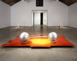 Robert Grosvenor Untitled, 1999 fossil rock, sheet metal, plastic and acrylic enamel paint rock pile left - 34 1/4 x 36 x 34 1/2” (85.6 x 90 x 86.2 cm), rock pile right - 34 1/4 x 35 1/2 x 36” (85.6 x 88.7 x 90 cm), platform - 5 3/4 x 176 x 89” (14.3 x 440 x 222.5 cm), two plastic elements - 24 1/2 x 24 1/2 x 93” (61.2 x 61.2 x 232.5 cm), each overall - 34 1/4 ” x 31’10” x 28’6” (85.6 cm x 9.5 m x 8.5 m)