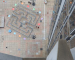 Labyrinth, 2015, created by Sam Durant for the City of Philadelphia Mural Arts Program's Open Source project, steel, 96 x 480 x 480 in. (243.8 x 1219.2 x 1219.2 cm), located at 1401 JFK Boulevard on Thomas Paine Plaza across the street from City Hall, Philadelphia, PA., Photo by Steve Weinik for the City of Philadelphia Mural Arts Program.