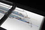 Tauba Auerbach
Non-Invasive Procedure, 2018
adjustable height medical table, light box, three lenses with stainless steel supports, polarized film, plastic and glass
medical table
overall dimensions: 69 1/2 x 48 x 95 in. (176.5 x 121.9 x 241.3 cm)