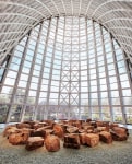 Céleste Boursier-Mougenot miner(e)ality, 2020 crushed recycled glass, 59 boulders, custom wood frame 14 x 14 m (46 x 46 feet) Installation view, The Tides of the Century, Ocean Flower Island Museum, Danzhou, Hainan Province ​February 8 – December 8, 2021