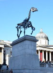 Hans Haacke Gift Horse, 2014 horse: bronze with black patina and wax finish stainless steel fasteners and supports bow: 5mm flexible LED display stainless steel armature polycarbonate face, 15 ft 3 in. x 14 ft 1 in. x 5 ft 5 in. (464.8 x 429.3 x 165.1 cm) Commissioned by the Mayor of London's Fourth Plinth Programme