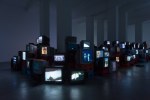 Douglas Gordon Pretty much every film and video work from about 1992 until now. 1999 82 video works on 101 TV monitors, video players, beer crates Installation 200 x 1530 x 620 cm / 78 3/4 x 602 3/8 x 244 1/8 in