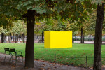 Outdoor view of yellow sculpture by Joe Bradley