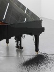 Installation by Liam Gillick, Factories In The Snow (Il Tempo Del Postino) 2007 Yamaha digital piano, midi file, snow machine, artificial black snow Dimensions variable 7:24 min