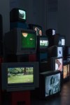 Douglas Gordon Pretty much every film and video work from about 1992 until now. 1999 82 video works on 101 TV monitors, video players, beer crates Installation 200 x 1530 x 620 cm / 78 3/4 x 602 3/8 x 244 1/8 in