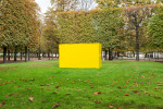 Outdoor view of yellow sculpture by Joe Bradley