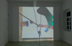 Installation view of projected film by Alex Hubbard