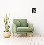 Mockup of the art hanging on a wall