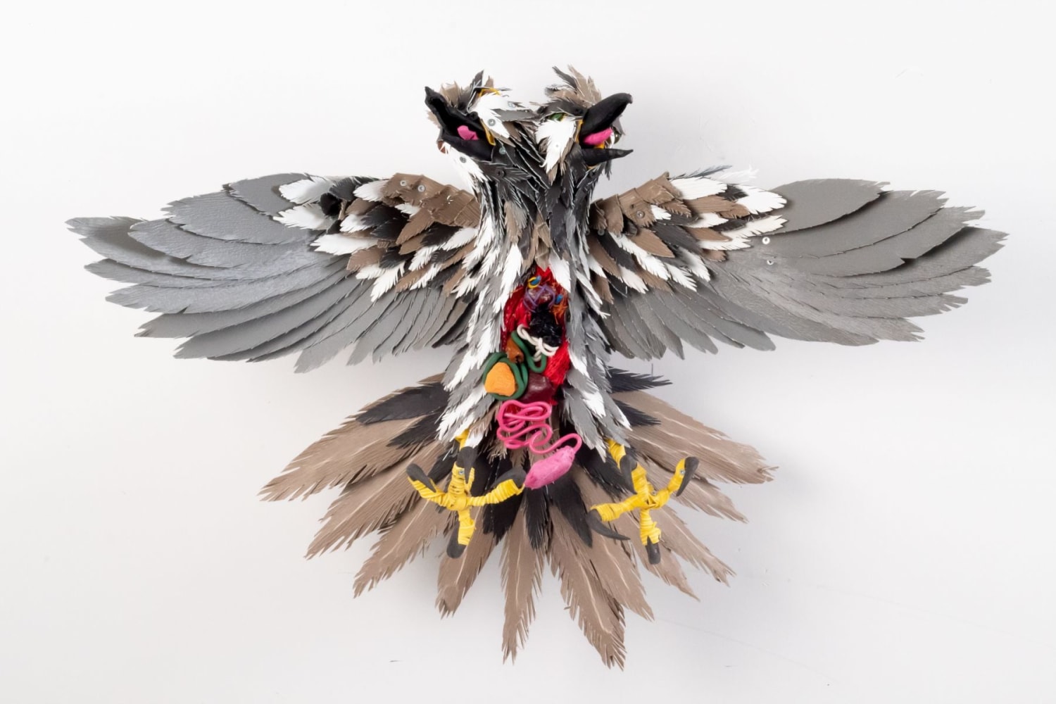 Divided Sky II, 2018, Scrap metal, screws, vinyl house siding, PVC, electrical wires, misc. plastics and textiles, glass marble, steel hardware, 30 x 12 x 20 inches