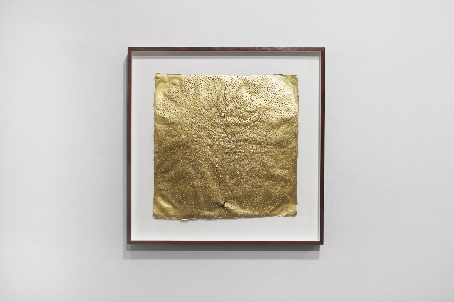 Elena del Rivero, Wound for Fontana in gold, 2014, 24k gold leaf on punctured abaca paper with needle and thread, 11.75 x 11.75 inches, unframed