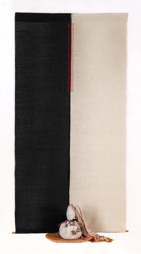 Shehnaz Ismail,&nbsp;All my hopes,&nbsp;2018,&nbsp;Hand woven cotton, cotton potli with silver, beaded and wooden amulets, red and yellow mannat threads interwoven with cotton and terracotta plate,&nbsp;93 x 49 in