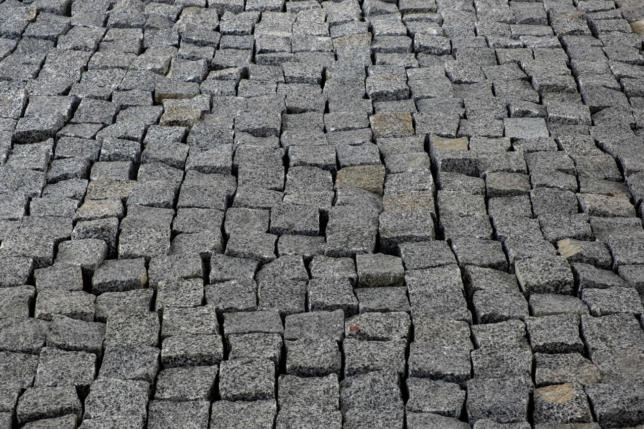 Nadia Kaabi-Linke,&nbsp;NYSE Road Works (Remont II),&nbsp;2021,&nbsp;Site-specific installation: cobblestones, wood, paint, sand, Dimensions variable