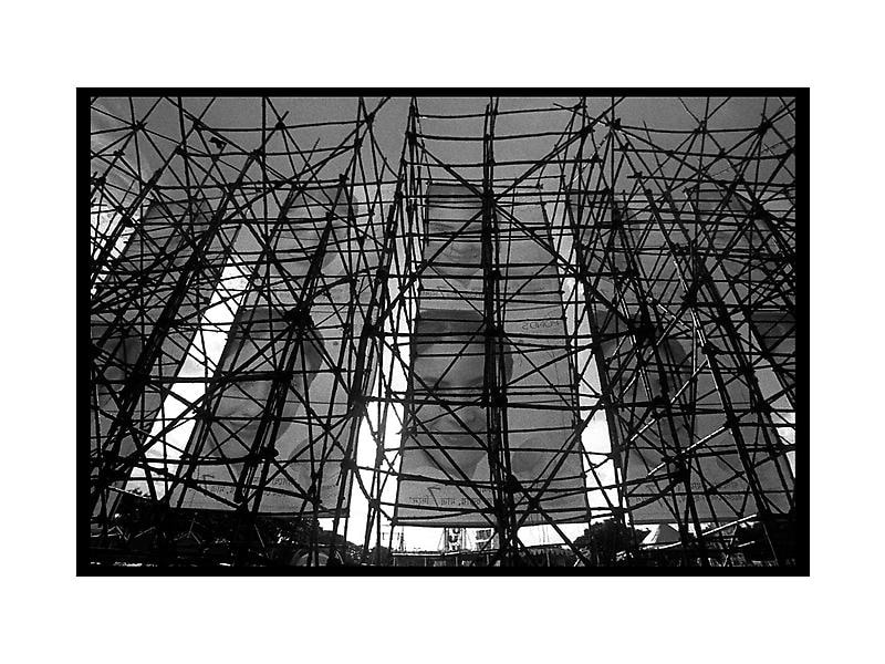 Sanjeet Chowdhury BAMBOO STRUCTURES BEING USED TO HOLD UP 40 FEET HOARDINGS