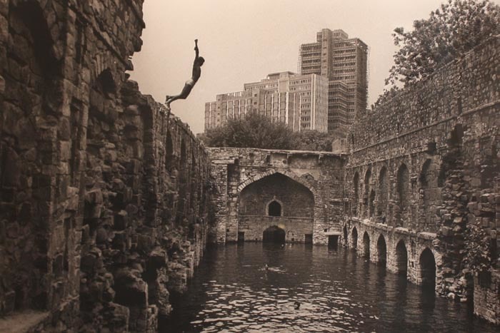 Raghu Rai Diving Into Ugrasen Baoli, Delhi (Ed. of 75)