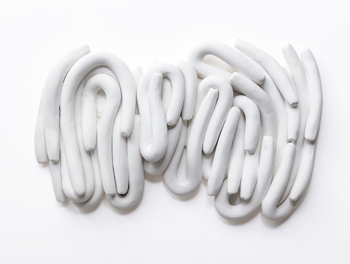 Anna Maria Maiolino,&nbsp;Untitled, from Cobrinhas (Little Snakes) series, 2018, Marble powder and white cement, 17 x 28 x 4 inches, 44 x 70 x 10 cm.&nbsp;&copy; Anna Maria Maiolino. Courtesy the artist&nbsp;and Hauser &amp;amp; Wirth.