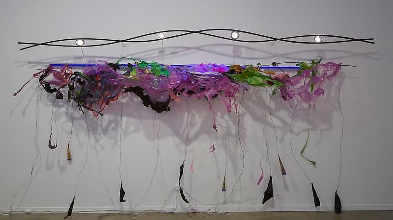 Ram&#039;s Delhi,&nbsp;2012, Wood, mild steel rod, melted plastics, black aluminum foil, LED and UV fluorescent light, 70 x 132 x 17 inches, MMG#20621