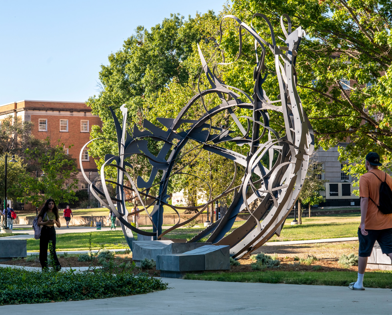 Matthew Ritchie's Shadow Garden, installed on campus, with students walking by