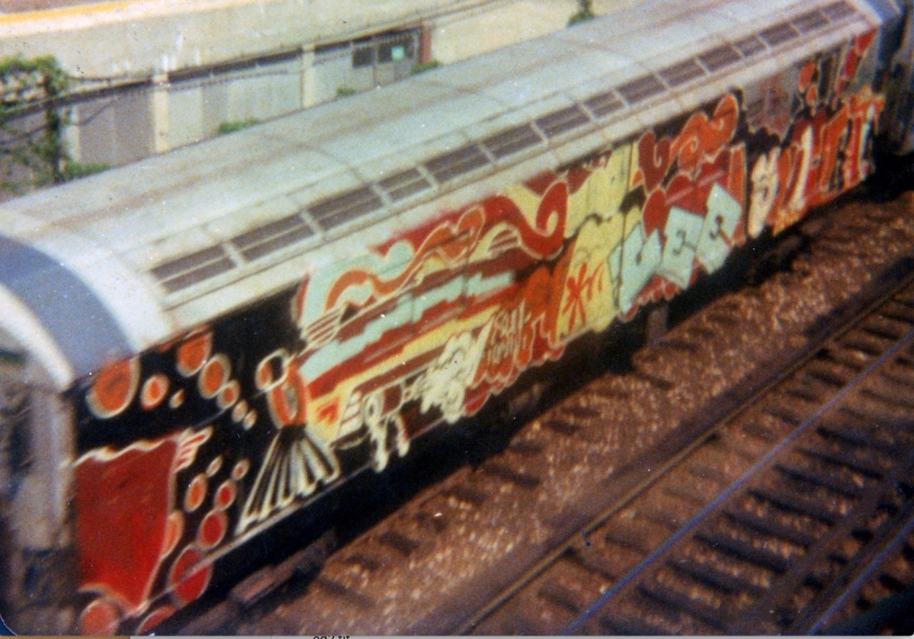 Lee Qui&ntilde;ones, Soul Train, 1975, On the I.R.T Lexington Avenue #5 line, Spray paint on metal, 52 x 7 feet. Courtesy of the artist and Ross+Kramer Gallery, New York