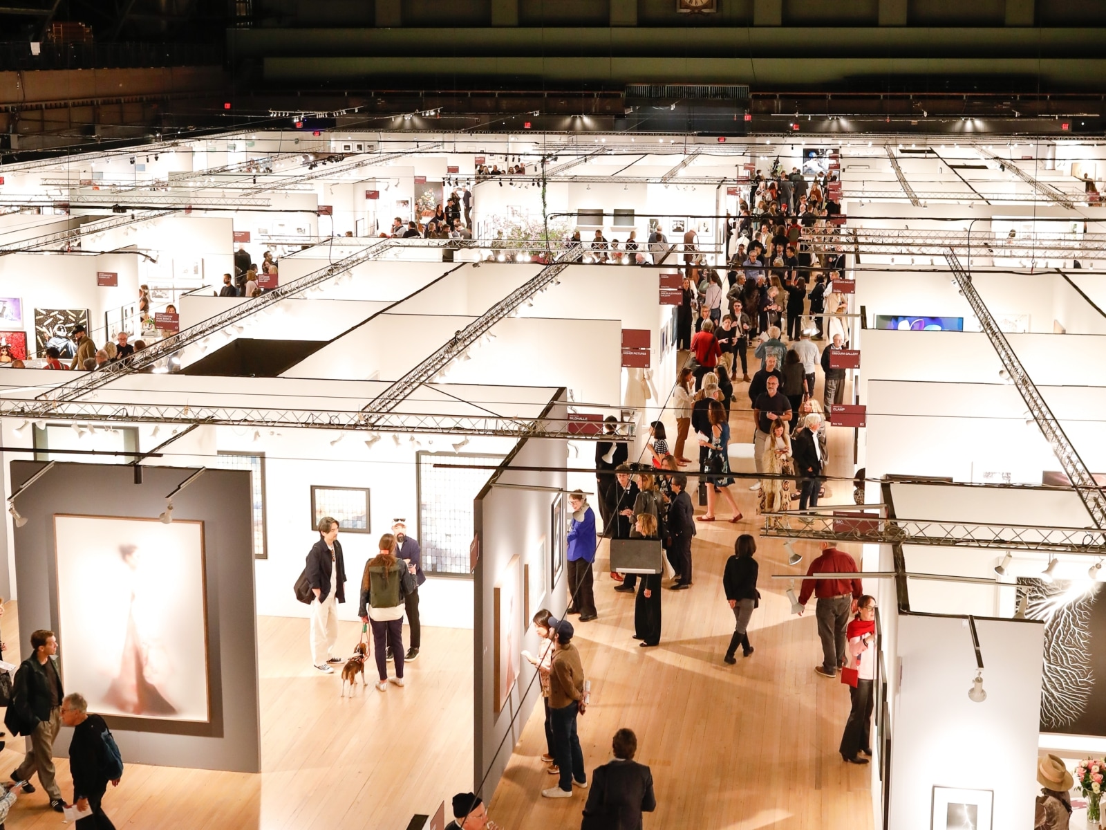 People walking the crowded aisles of The Photography Show
