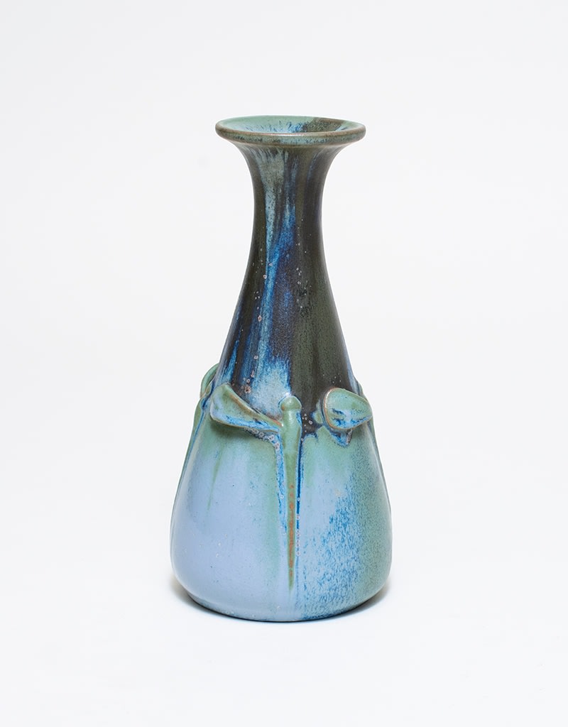 a french art nouveau glazed ceramic vase, tapered cylindrical form with flared mouth, the lower half with applied dragonflies with overlapping wings