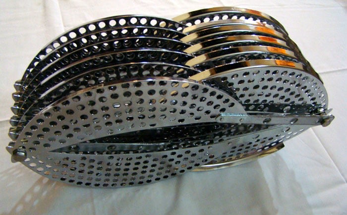 Adeela Suleman, Drainer 1, 2009 Electroplated pan, drainer, nuts and bolts, 7 x 13.50 x 4 in