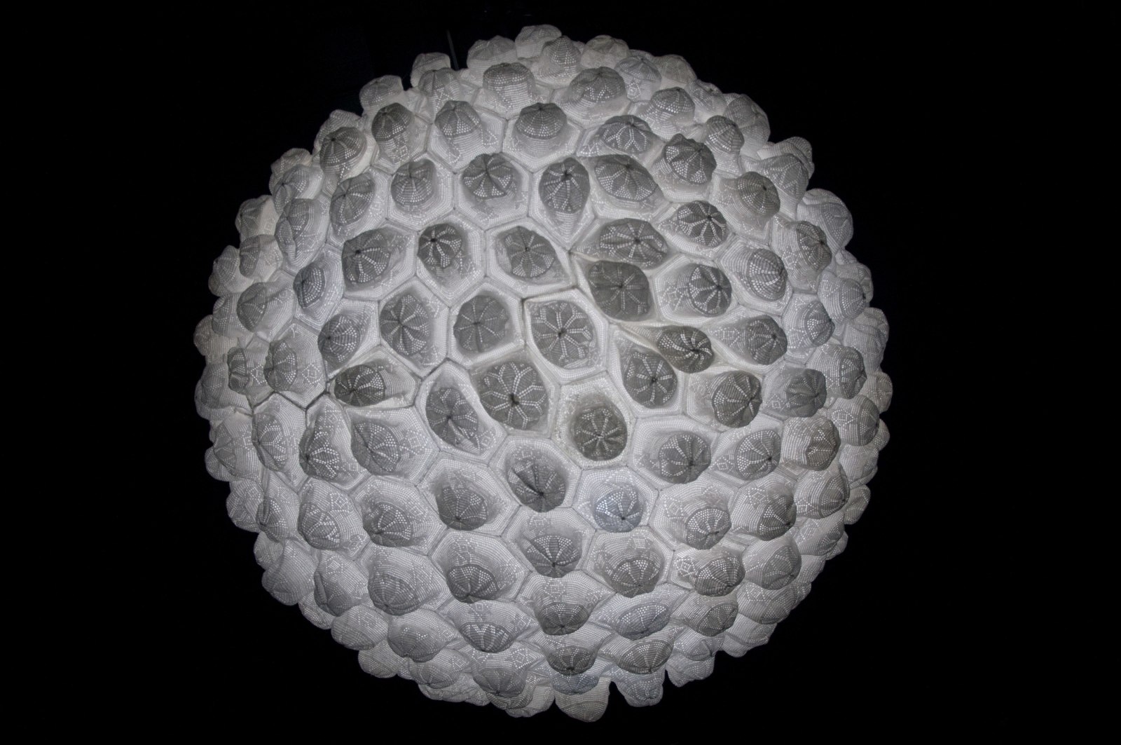 Abdullah M. I. Syed Nurun 'ala Nur (Light Upon Light), 2015 Hand-stiched white crouched taqiyah (skullcaps), LED light, Perspex dome and mirror Dimensions variable