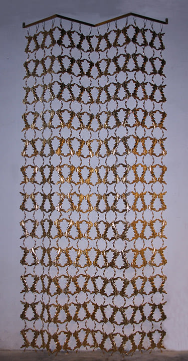 Adeela Suleman After All It's Always Somebody Else Who Dies (Gold), 2019 Gold on stainless steel with hand-beated repousse work 127 x 59 x 9 in