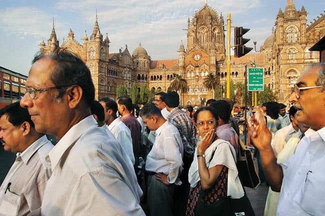 Raghu Rai Office goers at Victoria Terminus, Mumbai Edition of 10 2004 Digital scan of photographic negative on archival paper 18 x 27 in.