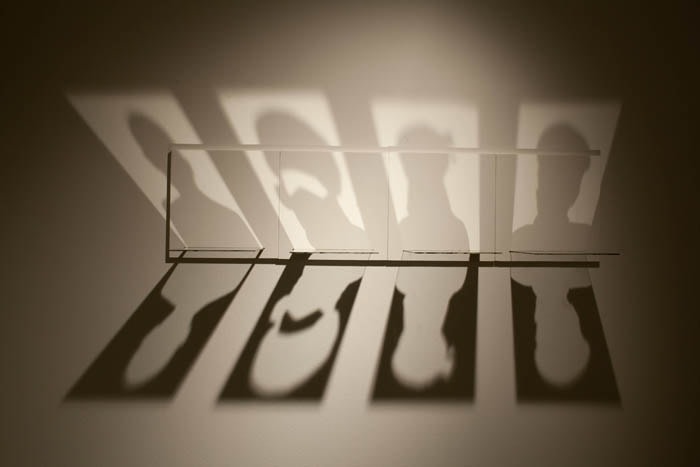 Amna Ilyas UNTITLED 5 (The Passport) 2009 Glass, silver, wood 12 x 48 x 10 in.