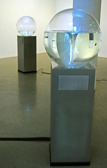 Simon Tegala A MATTER OF LIFE AND DEATH (2 pieces) 2010 Acrylic sphere, steel, water, electronic componants Sphere: 24 in diameter each, base: 43 x 18 x 18 in each