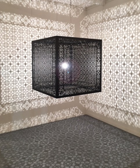 Anila Quayyum Agha Hidden Diamond (Ed. of 5) 2016 Laser-cut black lacquered steel and bulb 36 x 36 x 36 in.