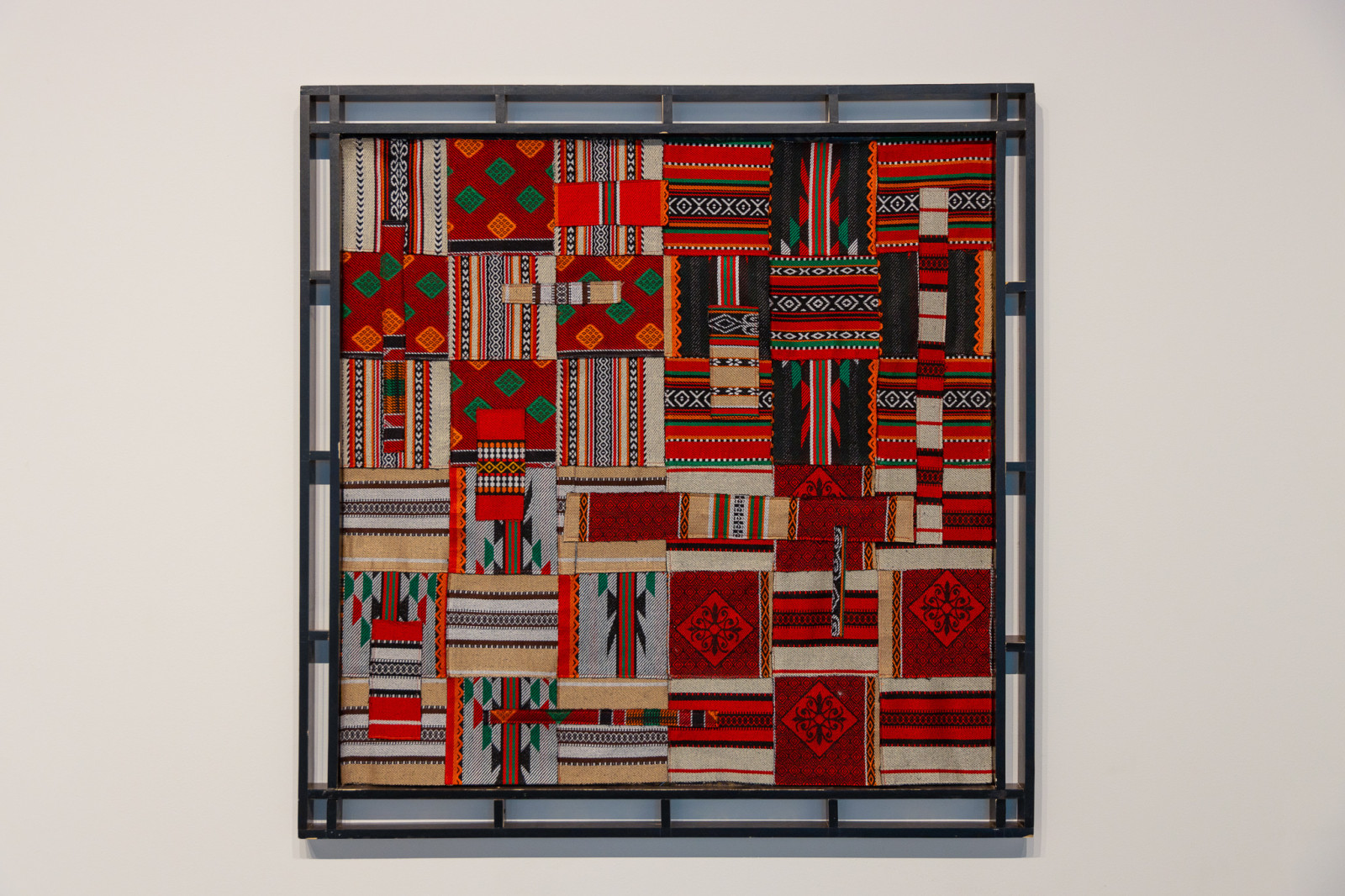 Christopher Joshua Benton The New Global Economy Fabric swatches from shuttered upholstery business, wood 42.91h x 42.91w in Framed: 48.43h x 48.43w in