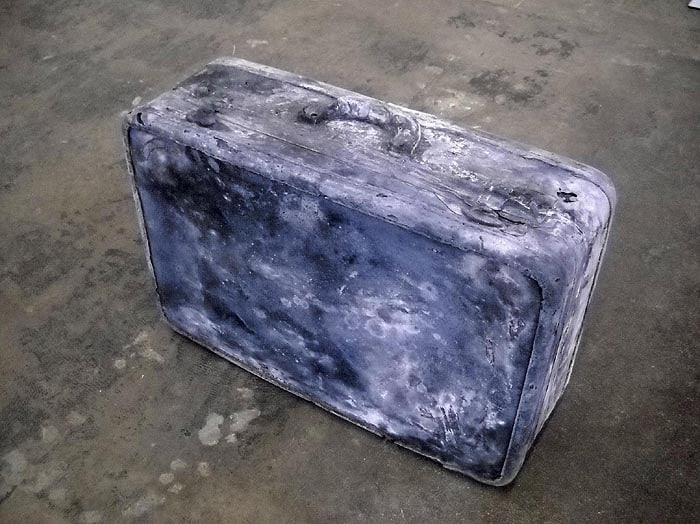 John Jurayj UNTITLED (LUGGAGE) 2010 Cast gunpowder and plaster 15 x 21 x 7 in. NFS