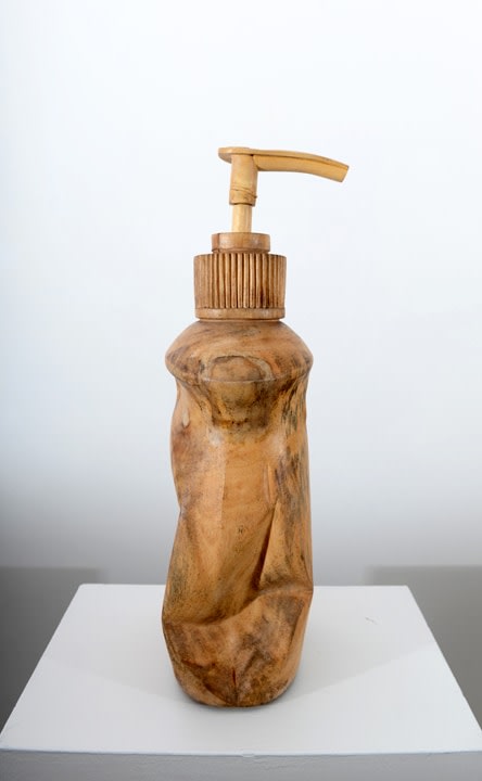 Debanjan Roy, Untitled (Shampoo Bottle), 2013, carved wood, 21 x 7 x 6 in