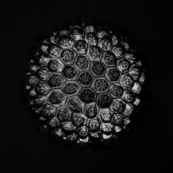 Abdullah M.I. Syed AURA I 2014 Hand-stitched black skull-caps, Perspex dome and neon light 42 in. (Dia.) x 22 in.