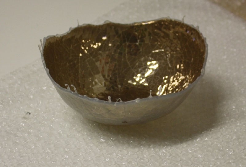 Anjali Srinivasan QUIVERING VESSEL 1 2001 Convex mirror glass and silicone Height: 3 in. / Dia: 7 in.