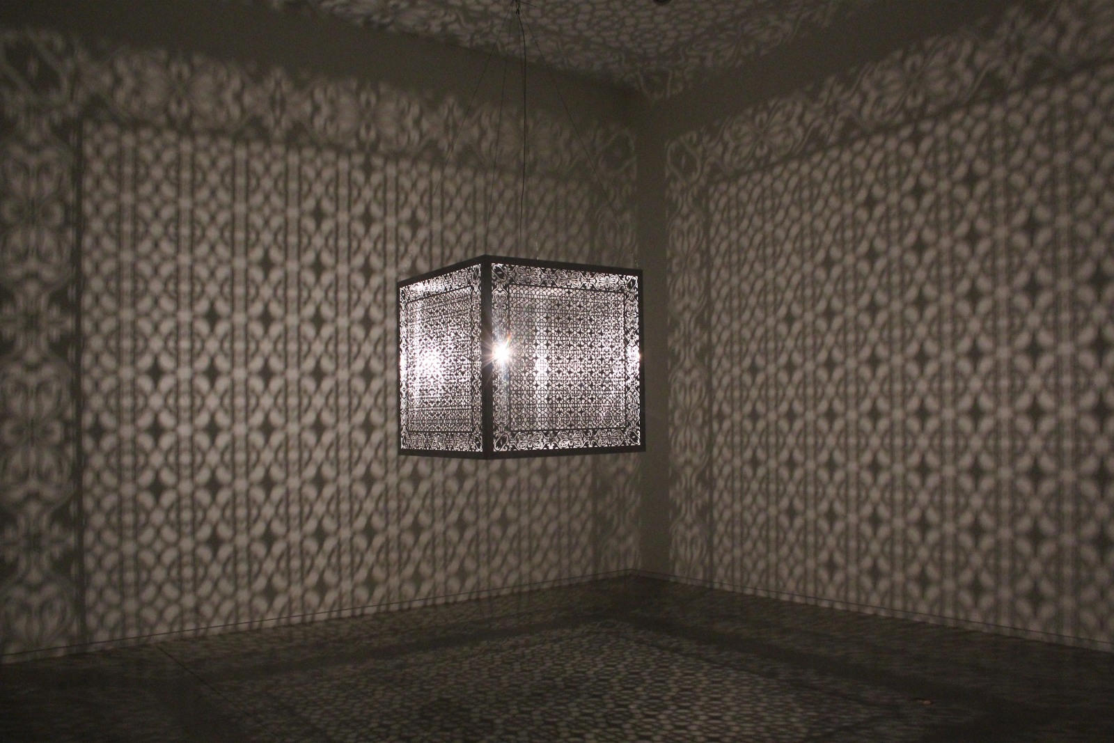 Anila Quayyum Agha Hidden Diamond 2016 Laser-cut stainless steel and bulb 36 x 36 x 36 in.