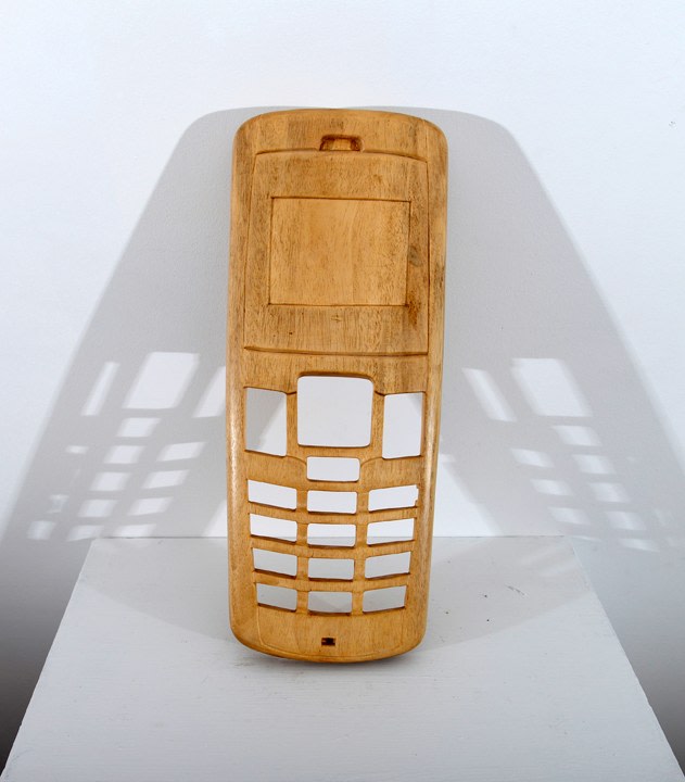 Debanjan Roy, Untitled (Mobile Cover), 2013, carved wood, 16 x 6 x 1.50 in