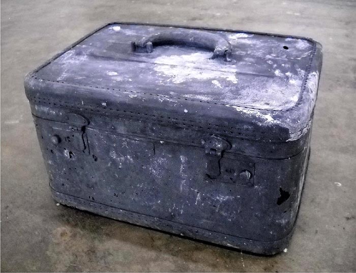 John Jurayj UNTITLED (WOMAN'S TRAVEL CASE) 2010 Cast gunpowder and plaster 8.5 x 14 x 10 in. NFS