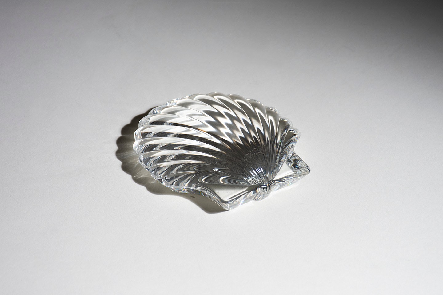 a crystal scallop shell in highly refractive clear lead crystal
