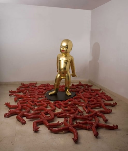 GOOD BAD AND UGLY 2008 Fiberglass, wood and acrylic 62 x 36 x 36.5 in. swastikas: dimensions variable