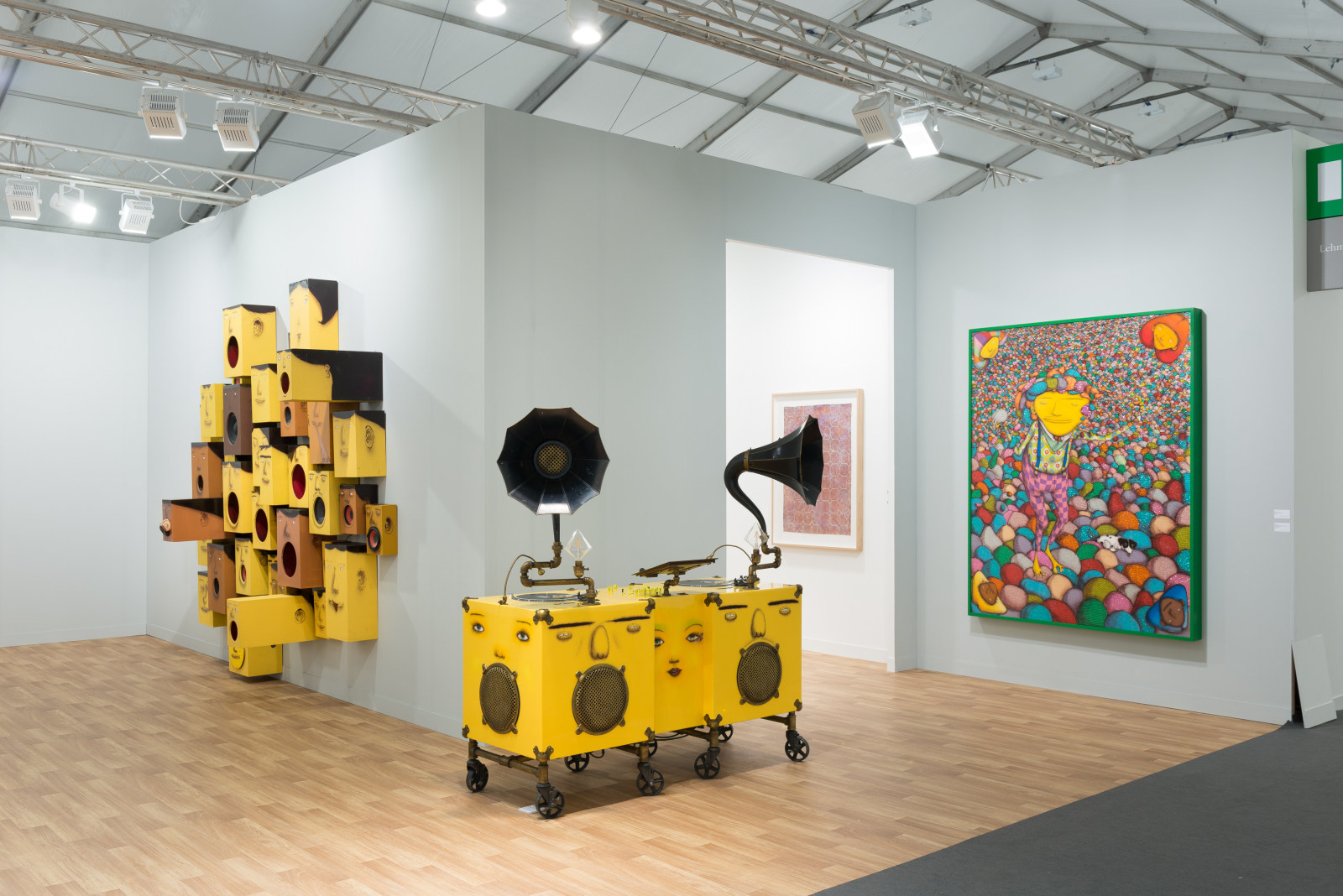 View of Lehmann Maupin's art fair booth at Frieze London 2018 featuring OSGEMEOS, perspective 4