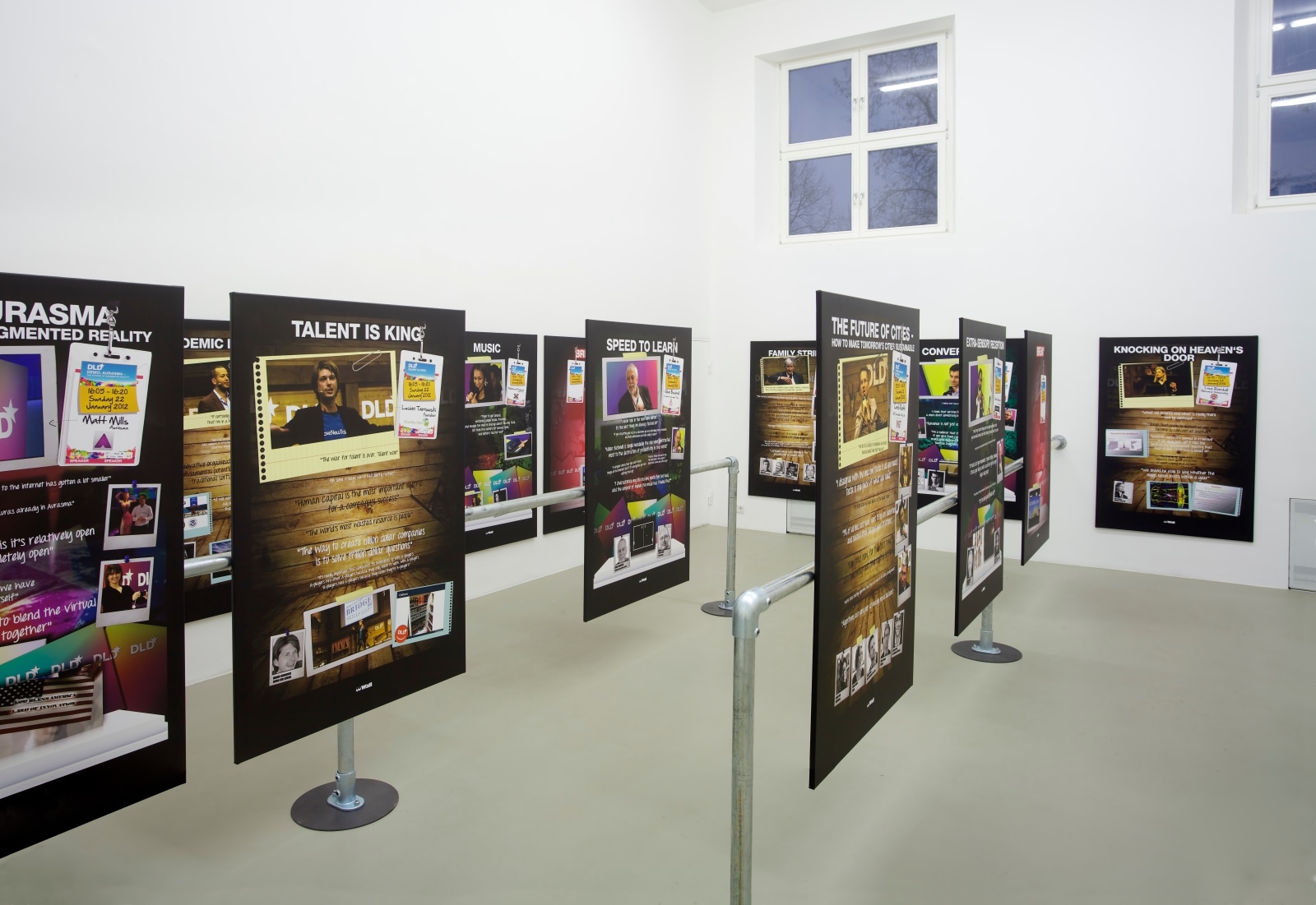 installation of All you need is Data at the Kunstverein Munich in 2013, featuring several large prints mounted on steel banisters in the center of the room