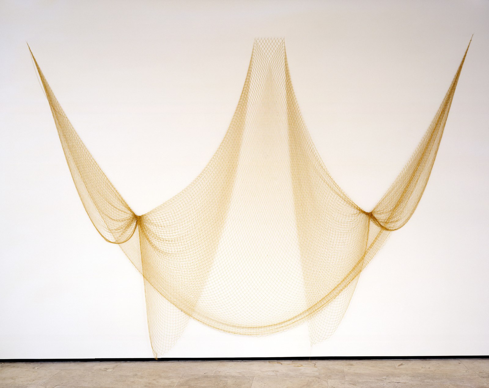 The power to be true to you, 2003, Gold lam&eacute; hand-knotted fishing net